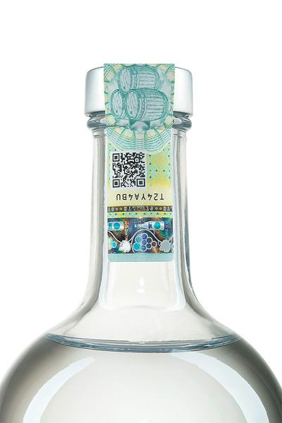Close-up of a tax stamp on a vodka bottle showing security features